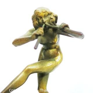 Cast Art Deco Statue of Female Nymph Playing Flute on Black Marble Base.  Measures approximately 9" tall. 