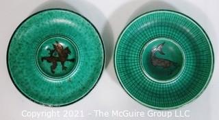 (2) Gustavsberg Argenta Stoneware Pottery Trays or Plates Designed by Wilhelm Kage with Silver Lion and Fish on Jade Green Base. Measures approximately 7" in diameter.