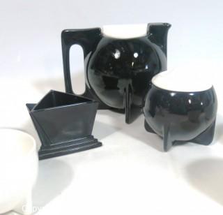 Art Deco Ceramic Black & White Tea Set including Teapot, Creamer, Sugar and Four Tea Cups. 