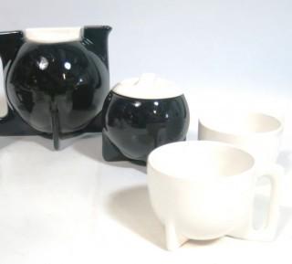 Art Deco Ceramic Black & White Tea Set including Teapot, Creamer, Sugar and Four Tea Cups. 