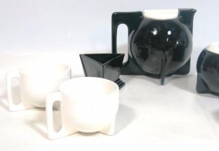 Art Deco Ceramic Black & White Tea Set including Teapot, Creamer, Sugar and Four Tea Cups. 