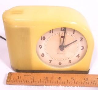 Vintage Art Deco Westclox Yellow Moon Beam Electric Alarm Clock; in Bakelite Case. 