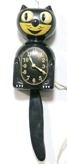 Vintage Black Kit Kat Electric Wall Clock with Moving Tail in Original Box.