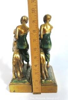 Pair of Art Deco Pompeian Bronze Enamel Wash Woman with Russian Wolfhound Dog Figural Bookends.