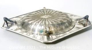 Two Piece Vintage Art Deco Silver Plate Serving Dish with Lid Made by Weidlich Bros with Geometric Design. Marked BMMTS for Britannia Metal Mounts.  Measures approximately 13" long