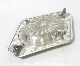 Two Piece Vintage Art Deco Silver Plate Serving Dish with Lid Made by Weidlich Bros with Geometric Design. Marked BMMTS for Britannia Metal Mounts.  Measures approximately 13" long