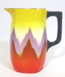 Vintage Ditmar Urbach Bohemian Czech Art Pottery Pitcher in Flame Pattern. Measures approximately 7" tall.