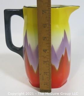 Vintage Ditmar Urbach Bohemian Czech Art Pottery Pitcher in Flame Pattern. Measures approximately 7" tall.