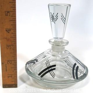 Palda Bohemian Czech Art Deco Cut Glass Perfume Bottle with Stopper.   Measures approximately 5 1/2" tall. <br> <br> Many of the Karl Palda Bohemian Art Deco cut glass pieces in this auction were featured in the book “Collectible Bohemian Glass (1915 – 1945) Volume II” by Robert & Deborah Truitt.