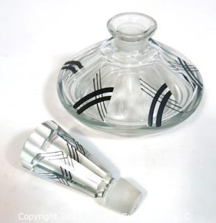 Palda Bohemian Czech Art Deco Cut Glass Perfume Bottle with Stopper.   Measures approximately 5 1/2" tall. <br> <br> Many of the Karl Palda Bohemian Art Deco cut glass pieces in this auction were featured in the book “Collectible Bohemian Glass (1915 – 1945) Volume II” by Robert & Deborah Truitt.