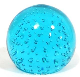 Blue Hand Blown Glass Paperweight.  Measures approximately 3" tall.  Small Chip on top.