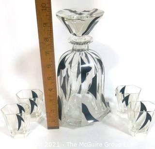 Karl Palda Bohemian Czech Art Deco Cut Glass Liquor Decanter with Black Decoration and 6 Glasses Similar.  Crystal stopper has been repaired. <br> <br> Many of the Karl Palda Bohemian Art Deco cut glass pieces in this auction were featured in the book “Collectible Bohemian Glass (1915 – 1945) Volume II” by Robert & Deborah Truitt.