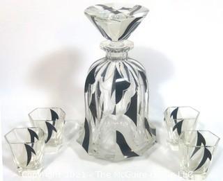 Karl Palda Bohemian Czech Art Deco Cut Glass Liquor Decanter with Black Decoration and 6 Glasses Similar.  Crystal stopper has been repaired. <br> <br> Many of the Karl Palda Bohemian Art Deco cut glass pieces in this auction were featured in the book “Collectible Bohemian Glass (1915 – 1945) Volume II” by Robert & Deborah Truitt.