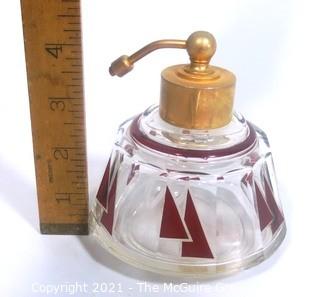 Karl Palda Bohemian Czech Art Deco Clear Cut Glass With Ruby Red Accents Perfume Bottle with Atomizer..  <br> <br> Many of the Karl Palda Bohemian Art Deco cut glass pieces in this auction were featured in the book “Collectible Bohemian Glass (1915 – 1945) Volume II” by Robert & Deborah Truitt.