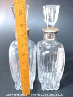 (2) Heavy Crystal Glass Scotch & Bourbon Liquor Decanters & Stoppers with Silver Overlay.  Some Splitting at Lip of Bottles. 