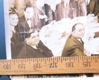 Vintage 1940 Unframed Black & White Photograph of  a Testimonial Dinner Dance to Honor Clifford Evans "Ears to the Ground" Column at The Hotel Bossert.   Measures approximately 20" long x 12" tall with some damage to edge.