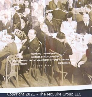 Vintage 1940 Unframed Black & White Photograph of  a Testimonial Dinner Dance to Honor Clifford Evans "Ears to the Ground" Column at The Hotel Bossert.   Measures approximately 20" long x 12" tall with some damage to edge.