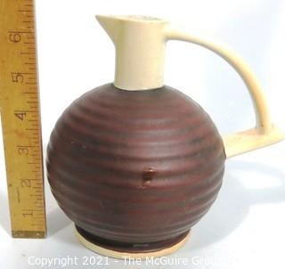 Vintage Brown & White Art Deco Erphila Pottery Jug. It measures approximately 6 1/2" tall.