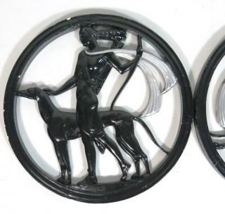 Pair of Vintage Art Deco Diana Goddess & Greyhound Dog Plaster Relief Wall Plaque of Greek God & Goddess with Dogs.  Has been repaired.  Measures approximately 16" in diameter. 