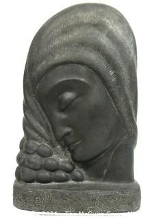 Art Deco Black Ceramic Statue of Woman in Profile.  Measures approximately 10" tall. 