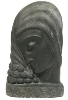 Art Deco Black Ceramic Statue of Woman in Profile.  Measures approximately 10" tall. 