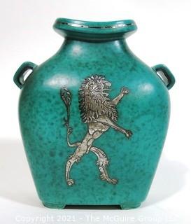 Gustavsberg Argenta Stoneware Pottery Vase Designed by Wilhelm Kage with Silver Lion on Jade Green Base. Measures approximately 8" tall.  Damage to bottom of vase.