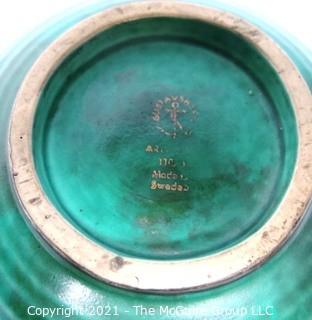 Gustavsberg Argenta Stoneware Pottery Bowl Designed by Wilhelm Kage with Silver Fish on Jade Green Base. Measures approximately 6" in diameter.