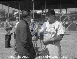 Baseball History: Lot includes 13 individual 35mm B&W negatives of Clifford Evans with several major league players including: H. Aaron, S. Musial, T. Kluszewski, F. Robinson, Bobby Bragan; Harvey Kuenn, Bobby Schantz; Fred Hutchinson; Brooks Lawrence and Al Cicotte. Also promotional flyer for Clifford Evans interviews with baseball players and a 1984 Baseball ID card.