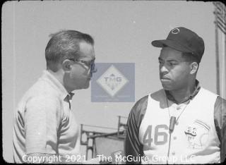 Baseball History: Lot includes 13 individual 35mm B&W negatives of Clifford Evans with several major league players including: H. Aaron, S. Musial, T. Kluszewski, F. Robinson, Bobby Bragan; Harvey Kuenn, Bobby Schantz; Fred Hutchinson; Brooks Lawrence and Al Cicotte. Also promotional flyer for Clifford Evans interviews with baseball players and a 1984 Baseball ID card.