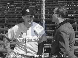 Baseball History: Lot includes 13 individual 35mm B&W negatives of Clifford Evans with several major league players including: H. Aaron, S. Musial, T. Kluszewski, F. Robinson, Bobby Bragan; Harvey Kuenn, Bobby Schantz; Fred Hutchinson; Brooks Lawrence and Al Cicotte. Also promotional flyer for Clifford Evans interviews with baseball players and a 1984 Baseball ID card.