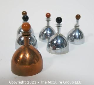 Set of 6 Mid Century Modern Chrome & Copper Dinner Service Hand Bells with Bakelite Decoration made by Chase. They Measure approximately 2 7/8" tall.