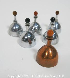 Set of 6 Mid Century Modern Chrome & Copper Dinner Service Hand Bells with Bakelite Decoration made by Chase. They Measure approximately 2 7/8" tall.