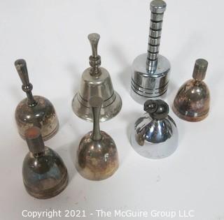 Collection of Seven Dinner Table Bells Including a pair of Christofle Ondulation Bells