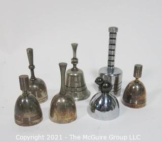 Collection of Seven Dinner Table Bells Including a pair of Christofle Ondulation Bells