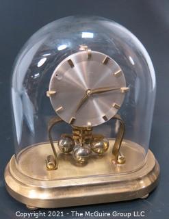 Brass with Glass Dome Perpetual Motion Clock Marked KS 