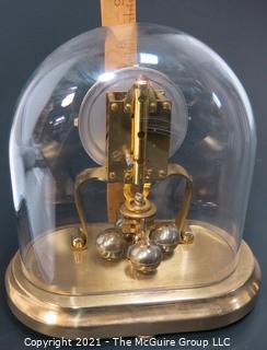 Brass with Glass Dome Perpetual Motion Clock Marked KS 