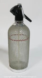 Vintage Art Deco Glass Soda Siphon Bottle with Silver Wire Mesh Covering.