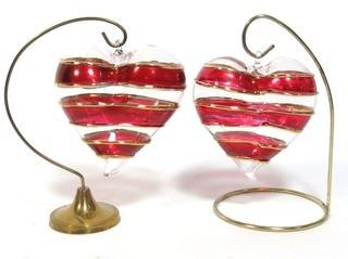 Two Large Hand Blown Clear with Red and Gold Overlay Venetian Glass Puffy Hearts with Stand.  Each measure approximately 4" wide.  