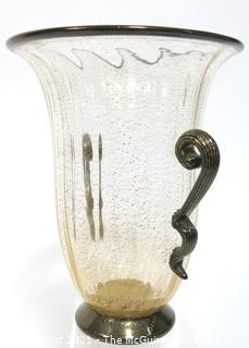 Hand Blown Venetian Glass Vase With Applied Ribbon Handles. Measures approximately 9" tall.