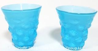 Pair of Blue Hand Blown Glass Beakers Encased In White Made by the Consolidated Glass Co. Measures approximately 5" tall.