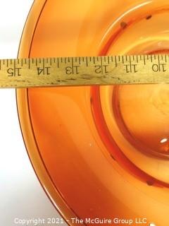 Hand Blown Orange Glass Bowl with Metal Threads and Beads.  Measures approximately 15" in diameter.