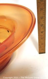 Hand Blown Orange Glass Bowl with Metal Threads and Beads.  Measures approximately 15" in diameter.