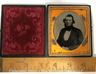 Antique Daguerreotype Plate Photograph Of A Man in Velvet Lined Hard Case.  Measures approximately 3" wide. 