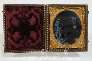 Antique Daguerreotype Plate Photograph Of A Married Couple in Velvet Lined Hard Case.  Measures approximately 3" wide x 4" tall.