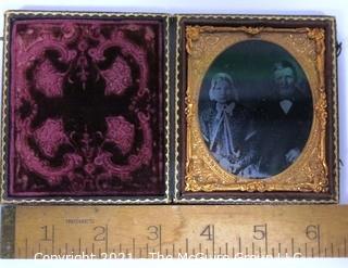 Antique Daguerreotype Plate Photograph Of A Married Couple in Velvet Lined Hard Case.  Measures approximately 3" wide x 4" tall.