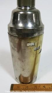 Vintage Silver Plate Cocktail Shaker with Dial a Drink Recipes on Side.