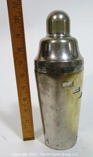 Vintage Silver Plate Cocktail Shaker with Dial a Drink Recipes on Side.