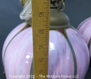 Pair of Ceiling Mount Chandeliers with Pink Tulip Form Slag Glass Shades. They measure approximately 11" in diameter x 8" tall.  One chandelier is missing ceiling mount hardware and cap.