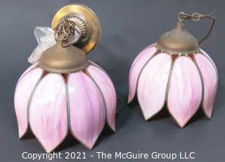 Pair of Ceiling Mount Chandeliers with Pink Tulip Form Slag Glass Shades. They measure approximately 11" in diameter x 8" tall.  One chandelier is missing ceiling mount hardware and cap.