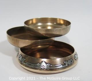 Three Piece Sterling Silver on Bronze Arts & Craft Period Nesting Trinket Trays Made by Heintz Art Metal for RH Macy Department Stores.  They measure approximately 3 1/2" in diameter.